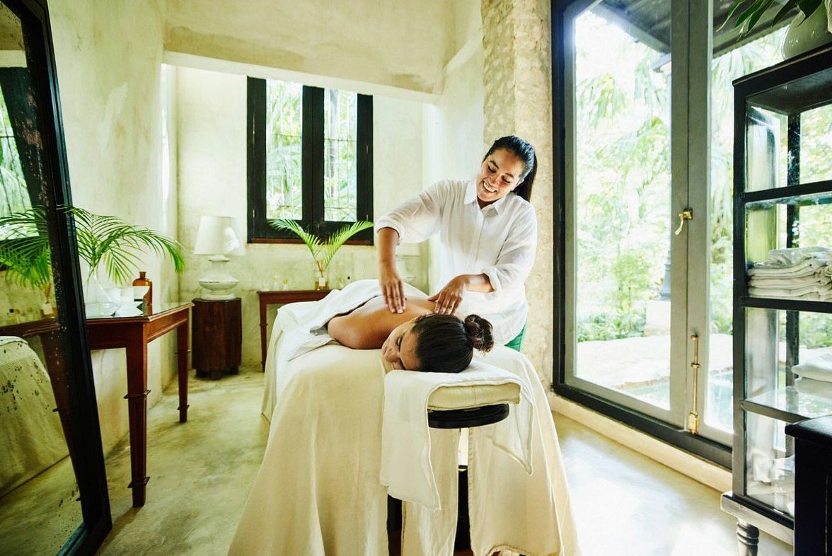Spa treatment room with stone, wool and alpine light at Wowwavehouse